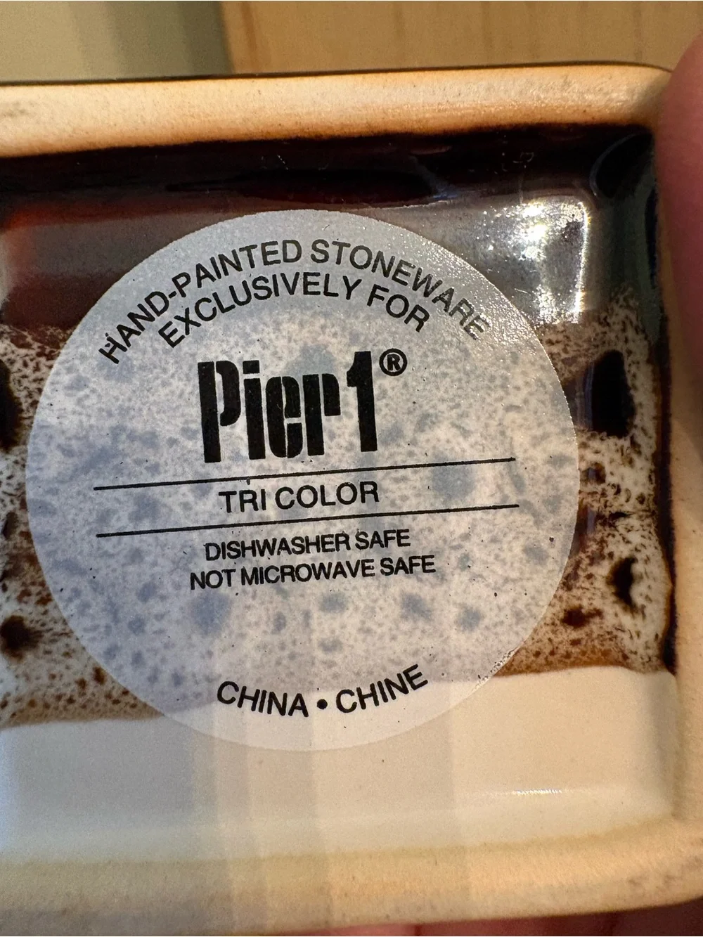 Pier 1 Imports tricolor stoneware square espresso mugs in brown, white, and tan.